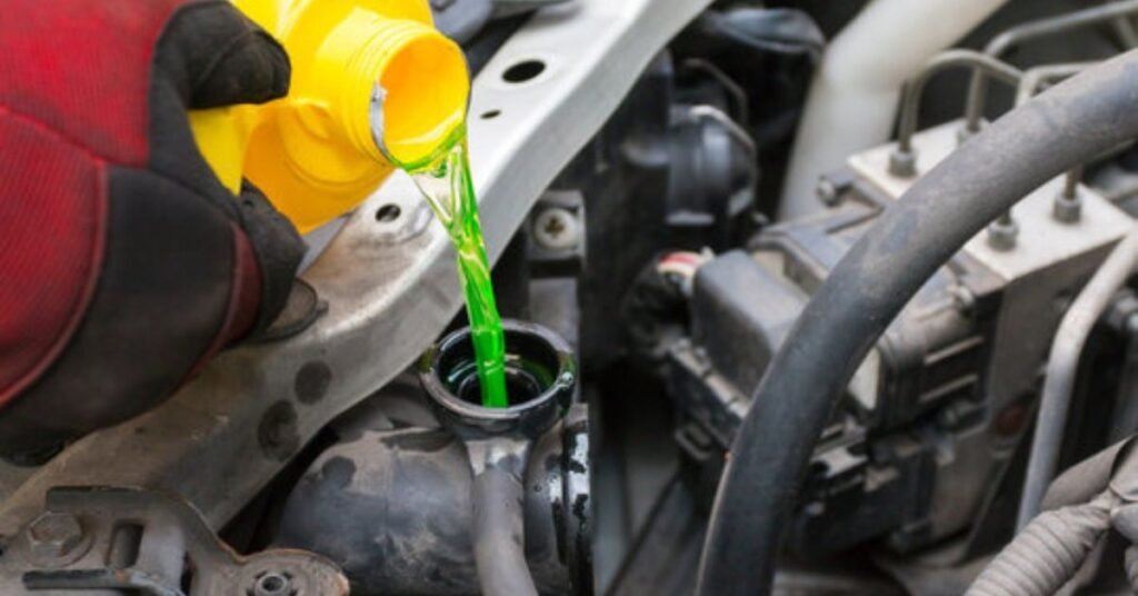 adding coolant to car